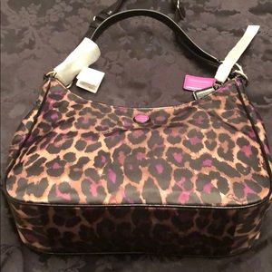 Brand new violet jaguar Coach hobo bag.